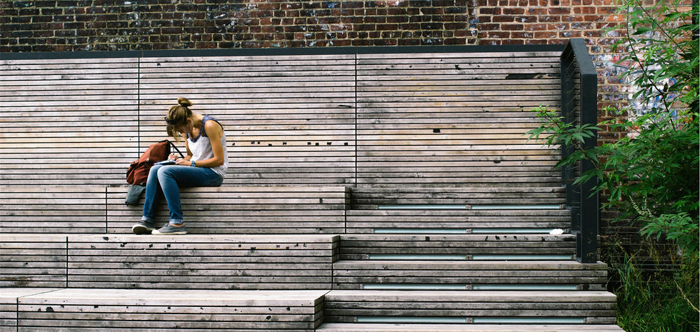Girl reading on steps